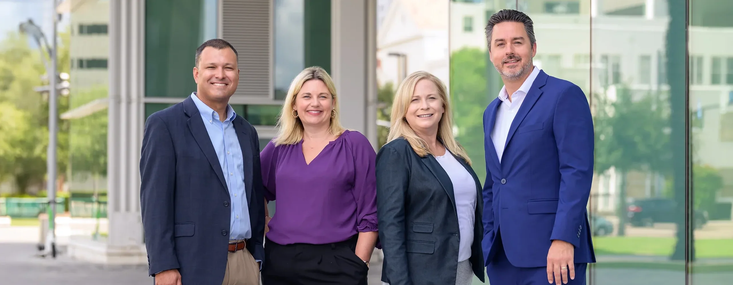 A group of Summit employees with LRA Insurance President, James Lumbra.