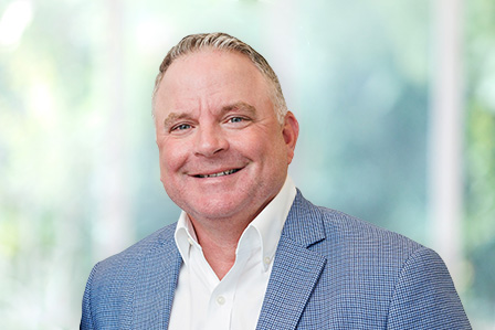 Headshot of Bret Hughes.