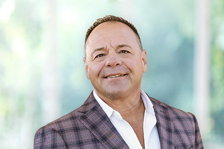 Headshot of Greg Lane.
