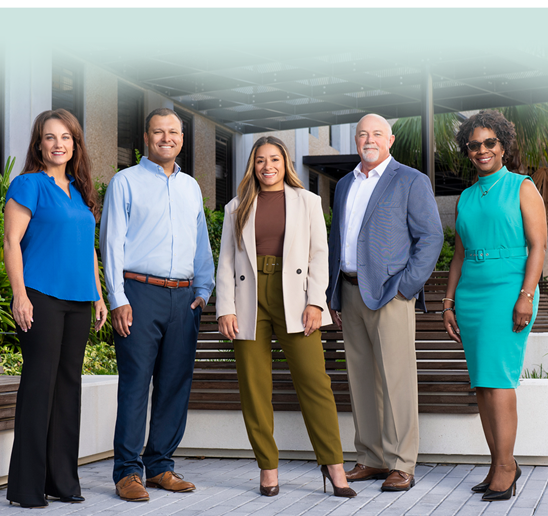 Summit team members outside the Summit office building.