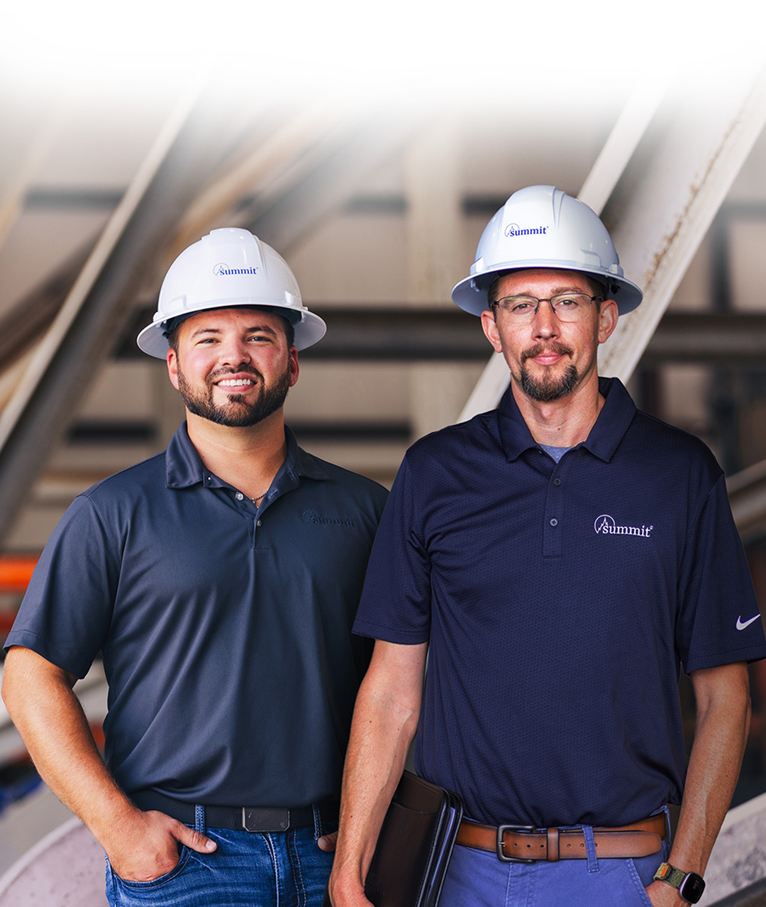 Two Summit field loss prevention consultants on a job site.