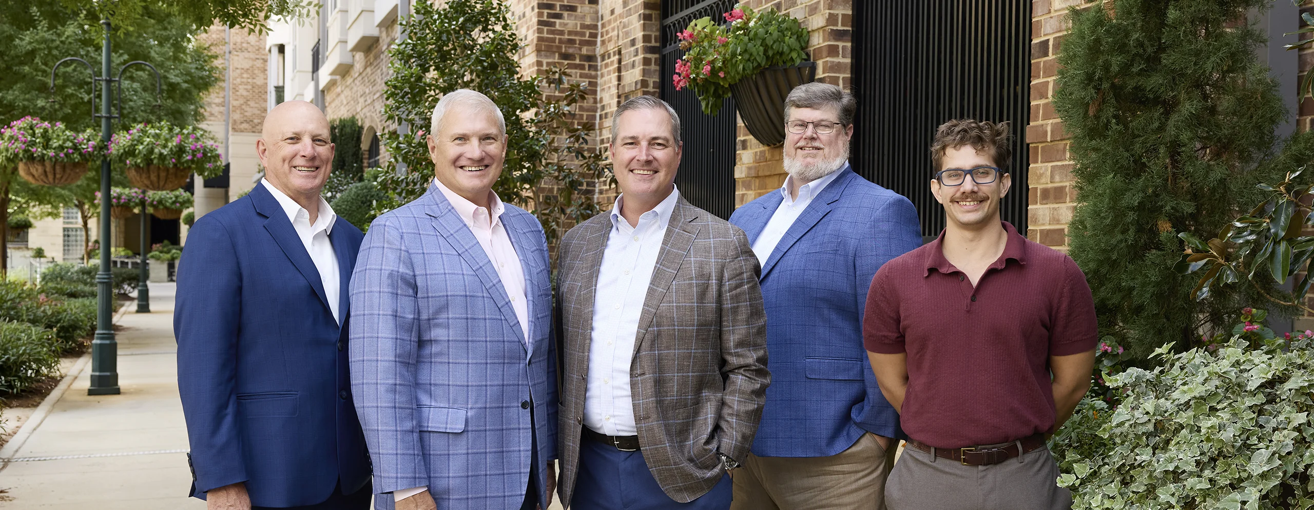 A group of Summit employees with IMA Carolinas leaders Jeff Haney and Rich Garner.